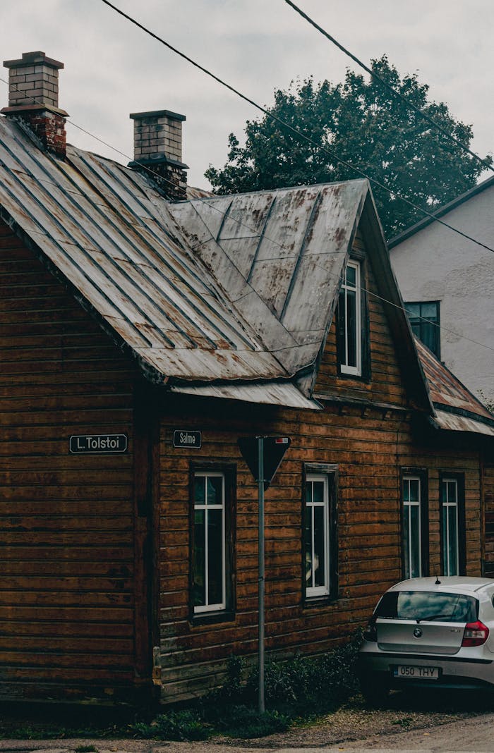Home Historic wooden house at L. Tolstoi street in Tartu, Estonia, showcasing classic architecture.