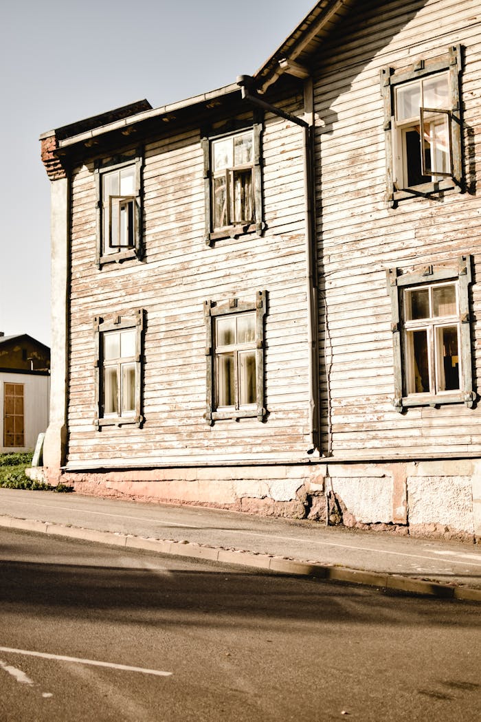 Home Close-up of a weathered wooden building facade in Tartu, depicting historic architecture.